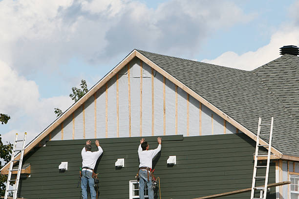 Professional Siding technician working in Henderson, NC